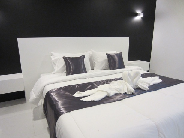 Imagen de la habitación del Hotel The Luna Compass. Foto 9