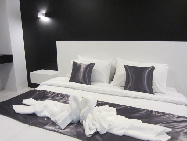 Imagen de la habitación del Hotel The Luna Compass. Foto 11