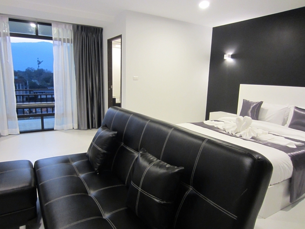 Imagen de la habitación del Hotel The Luna Compass. Foto 14