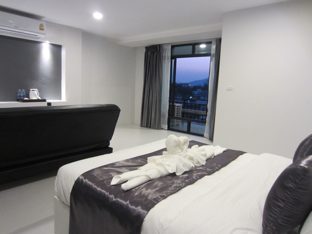 Imagen de la habitación del Hotel The Luna Compass. Foto 17
