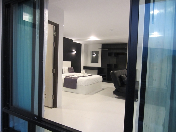Imagen de la habitación del Hotel The Luna Compass. Foto 18