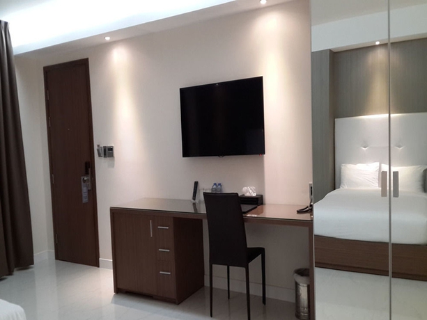 Imagen de la habitación del Hotel The Luxe. Foto 6