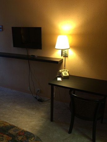 Imagen de la habitación del Hotel The M @ 6603 I-Drive. Foto 7