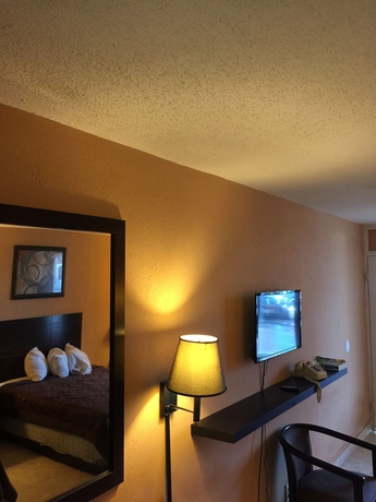 Imagen de la habitación del Hotel The M @ 6603 I-Drive. Foto 9