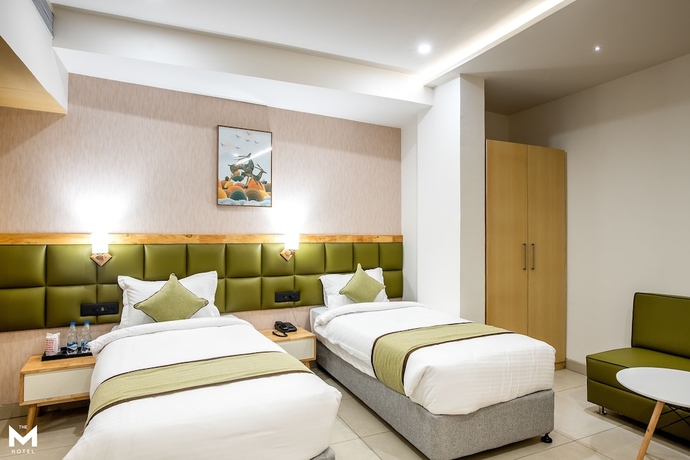 Imagen de la habitación del Hotel The M Raipur. Foto 6