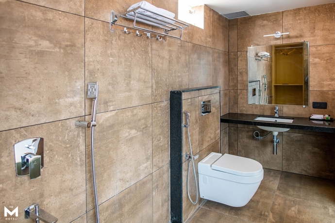 Imagen de la habitación del Hotel The M Raipur. Foto 11