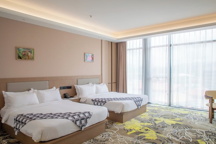 Imagen de la habitación del Hotel The MAJULAN. Foto 3