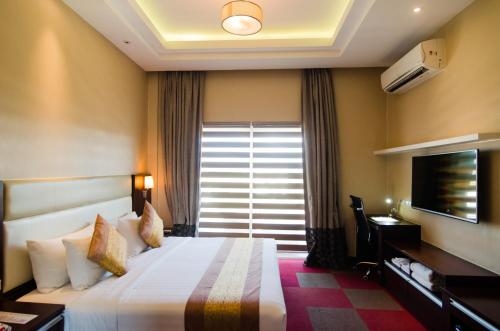 Imagen de la habitación del Hotel The MG Grand Hotel - Subic. Foto 3