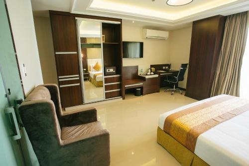 Imagen de la habitación del Hotel The MG Grand Hotel - Subic. Foto 5