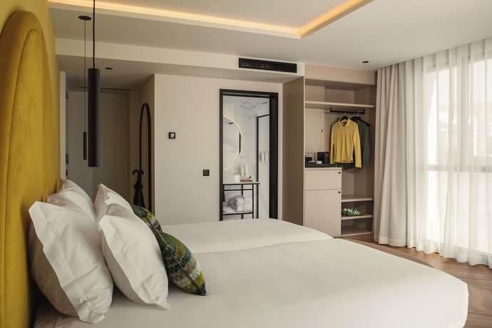 Imagen de la habitación del Hotel The MN56. Foto 2