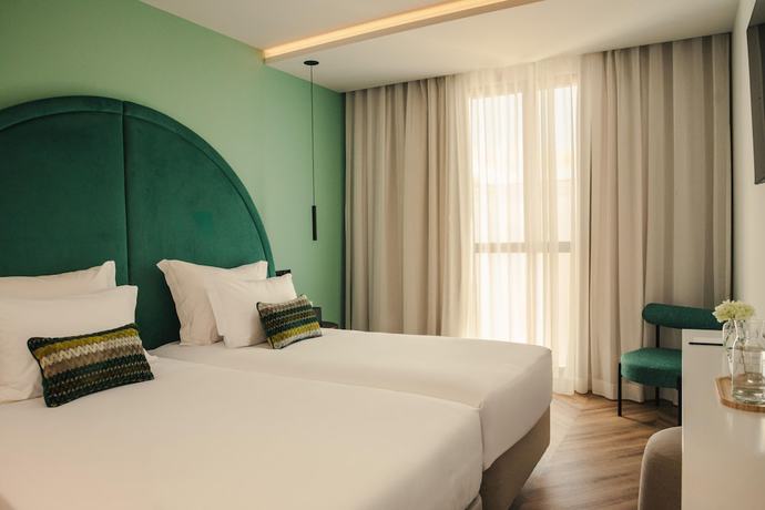 Imagen de la habitación del Hotel The MN56. Foto 3