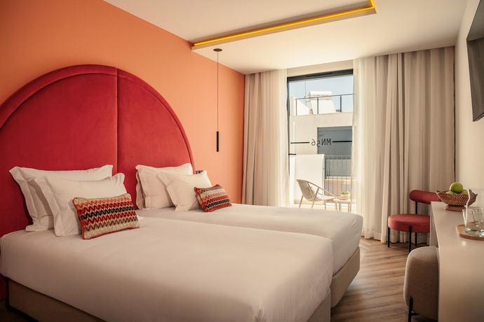 Imagen de la habitación del Hotel The MN56. Foto 6