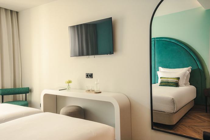 Imagen de la habitación del Hotel The MN56. Foto 8