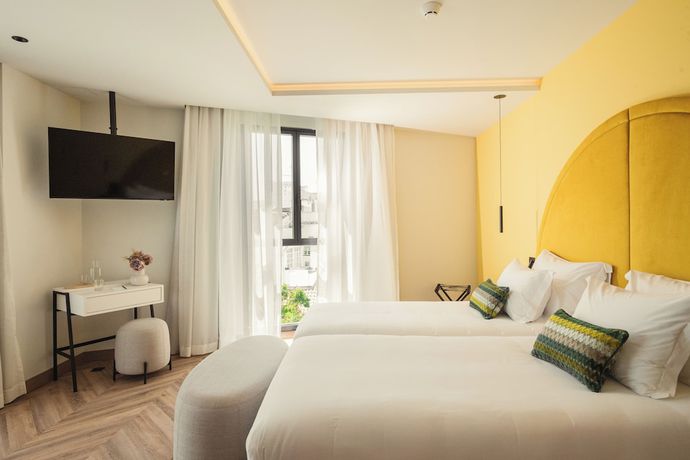 Imagen de la habitación del Hotel The MN56. Foto 10