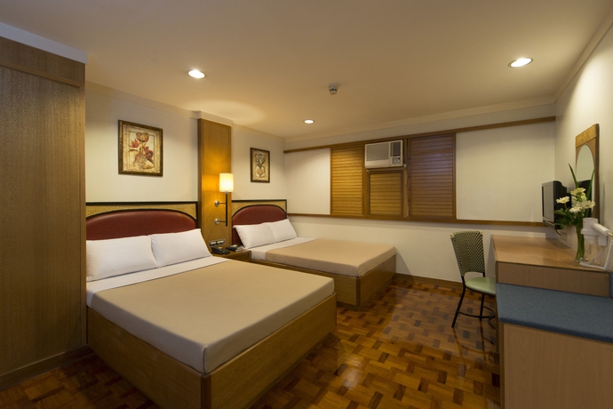 Imagen de la habitación del Hotel The Mabuhay Manor. Foto 5
