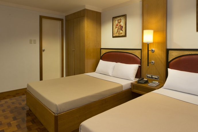 Imagen de la habitación del Hotel The Mabuhay Manor. Foto 6