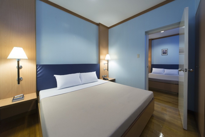 Imagen de la habitación del Hotel The Mabuhay Manor. Foto 7