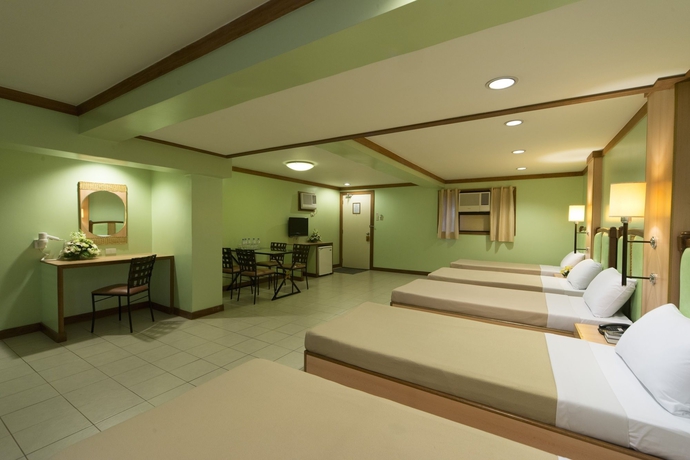 Imagen de la habitación del Hotel The Mabuhay Manor. Foto 8