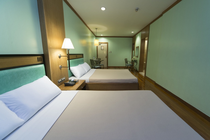 Imagen de la habitación del Hotel The Mabuhay Manor. Foto 11