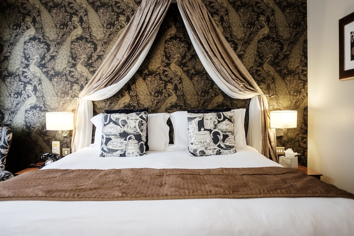 Imagen de la habitación del Hotel The Mad Hatter. Foto 5