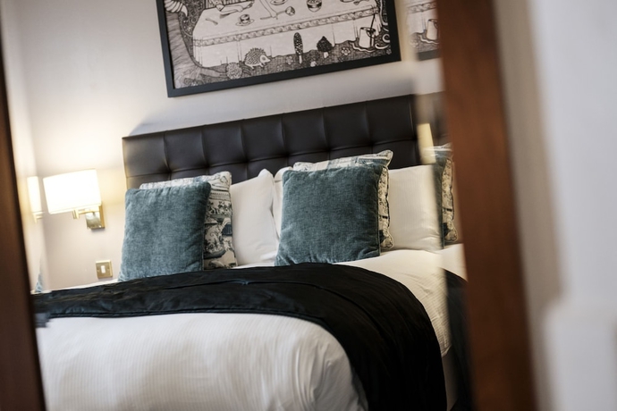 Imagen de la habitación del Hotel The Mad Hatter. Foto 8