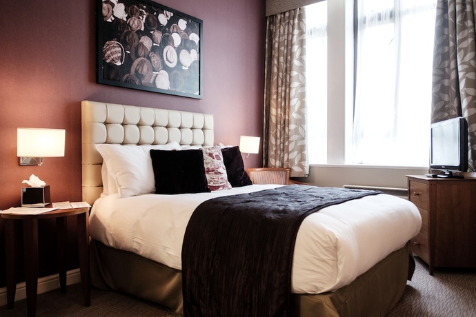 Imagen de la habitación del Hotel The Mad Hatter. Foto 10