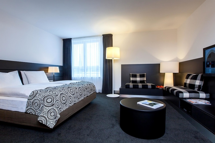 Imagen de la habitación del Hotel The Madison Hamburg. Foto 3