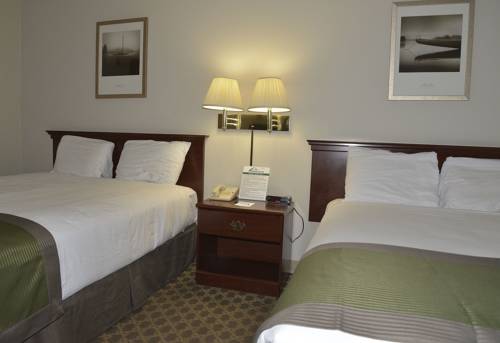Imagen de la habitación del Hotel The Madison Inn. Foto 4