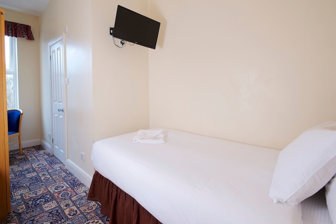 Imagen de la habitación del Hotel The Maemar. Foto 14