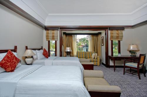 Imagen de la habitación del Hotel The Magellan Sutera Resort. Foto 3