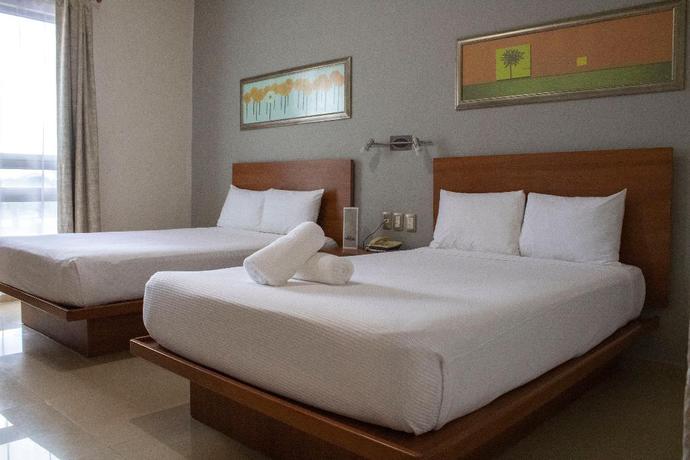 Imagen de la habitación del Hotel The Magic. Foto 8