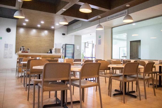 Imagen del bar/restaurante del Hotel The Magic. Foto 3