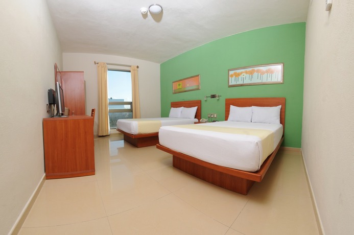 Imagen de la habitación del Hotel The Magic. Foto 9