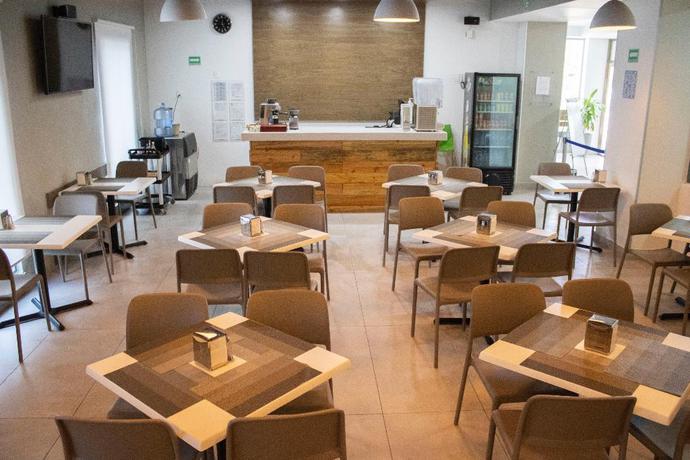 Imagen del bar/restaurante del Hotel The Magic. Foto 5