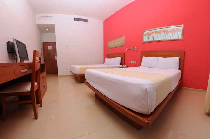 Imagen de la habitación del Hotel The Magic. Foto 11