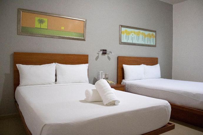 Imagen de la habitación del Hotel The Magic. Foto 13