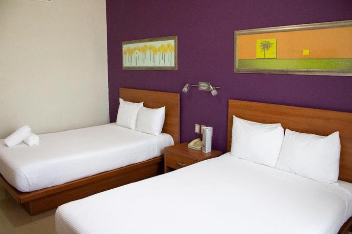 Imagen de la habitación del Hotel The Magic. Foto 15