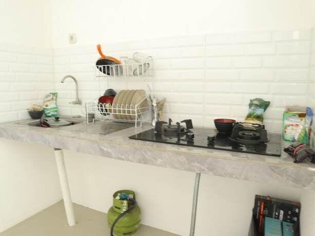 Imagen general del Hotel The Maguwo Premiere Kost Ekslusif. Foto 2