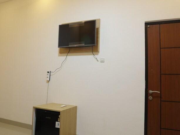 Imagen general del Hotel The Maguwo Premiere Kost Ekslusif. Foto 7