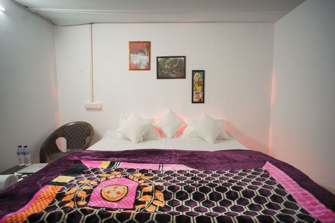 Imagen de la habitación del Hotel The Mahakumbh Vatika. Foto 9