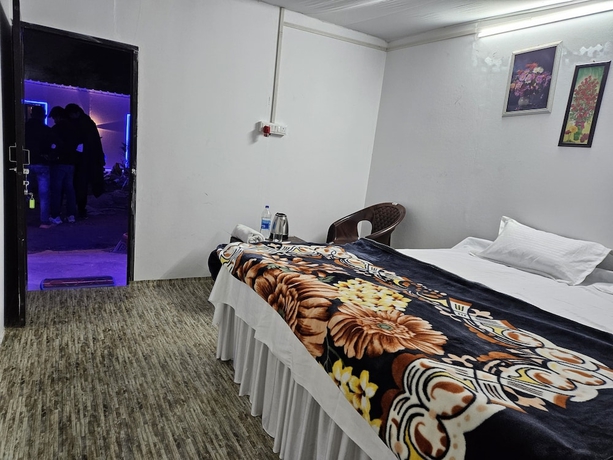 Imagen de la habitación del Hotel The Mahakumbh Vatika. Foto 10