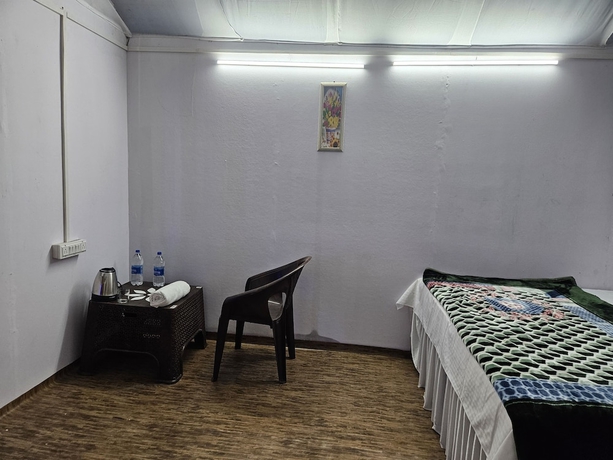 Imagen de la habitación del Hotel The Mahakumbh Vatika. Foto 12
