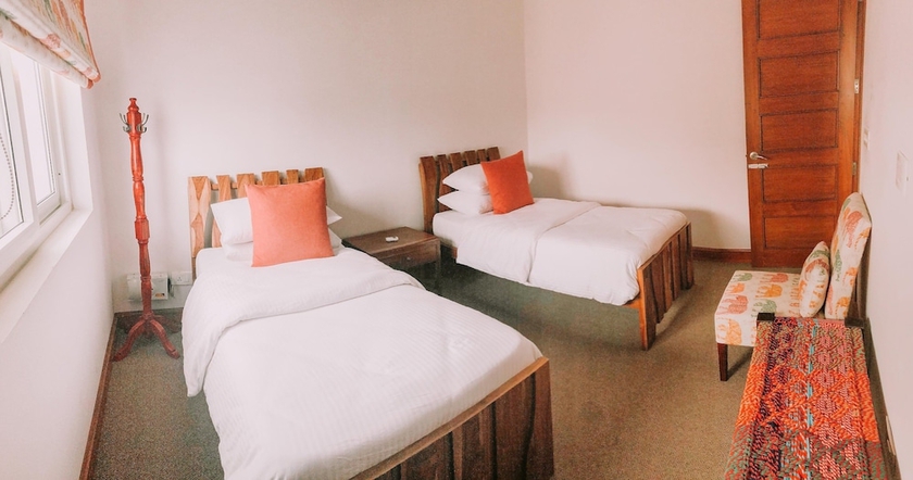 Imagen de la habitación del Hotel The Mahal Luxurious Homestay. Foto 4