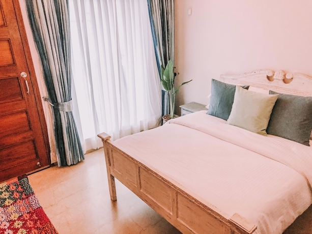 Imagen de la habitación del Hotel The Mahal Luxurious Homestay. Foto 8