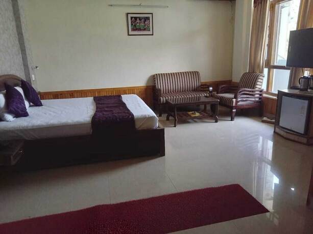 Imagen de la habitación del Hotel The Mahesh Regency. Foto 14