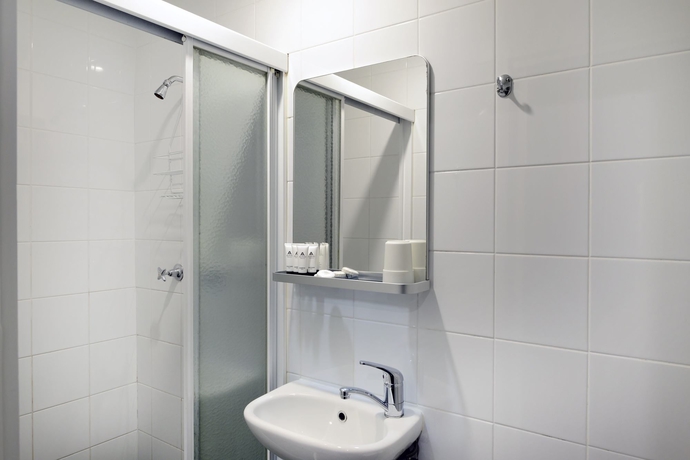 Imagen de la habitación del Hotel The Maisonette. Foto 9