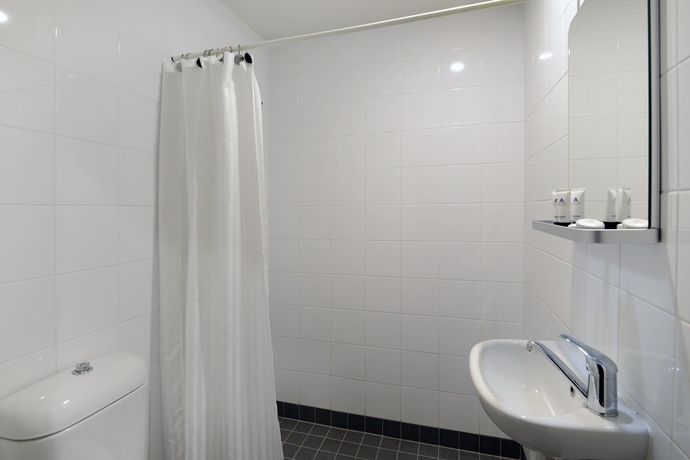 Imagen de la habitación del Hotel The Maisonette. Foto 11