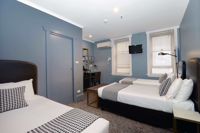 Imagen de la habitación del Hotel The Maisonette. Foto 12