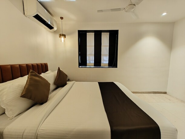 Imagen de la habitación del Hotel The Majlis - Near Taj Colaba. Foto 11