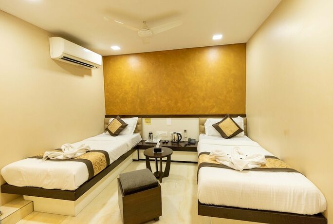 Imagen de la habitación del Hotel The Majlis - Near Taj Colaba. Foto 13